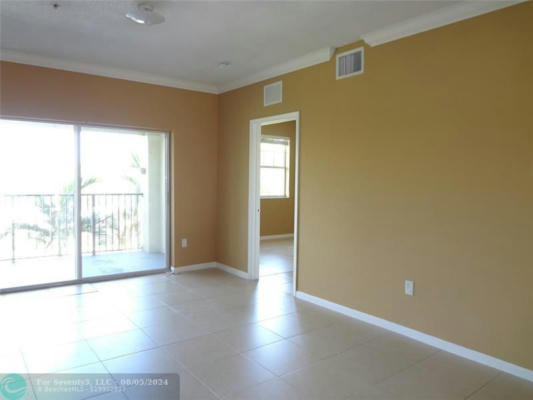 5960 W SAMPLE RD APT 307, CORAL SPRINGS, FL 33067, photo 2 of 5