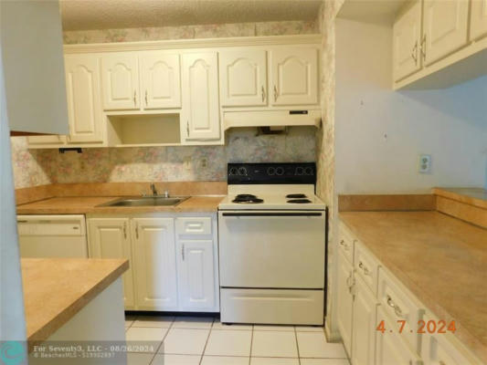 915 NE 199TH ST APT 208, MIAMI, FL 33179, photo 3 of 11