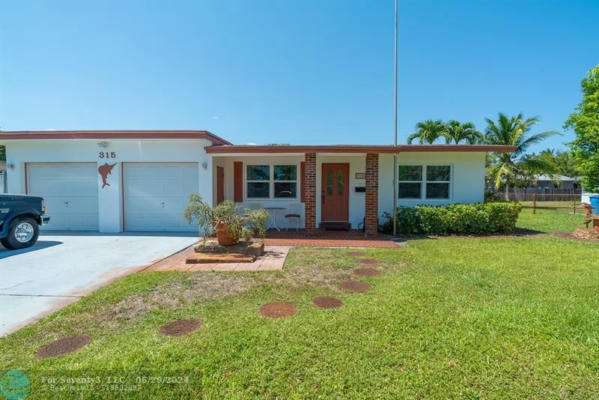 315 NW 40TH CT, OAKLAND PARK, FL 33309 - Image 1