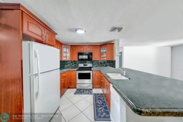 4957 SW 20TH ST, FORT LAUDERDALE, FL 33317, photo 4 of 17