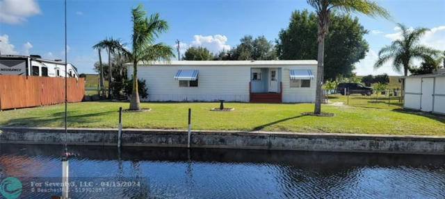 1065 ECHO AVE, OTHER CITY - IN THE STATE OF FLORIDA, FL 33471, photo 4 of 24