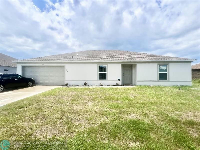381 SW BUTLER AVE, PORT ST LUCIE, FL 34983, photo 1 of 21