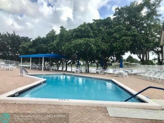 9091 LIME BAY BLVD APT 115, TAMARAC, FL 33321, photo 2 of 21