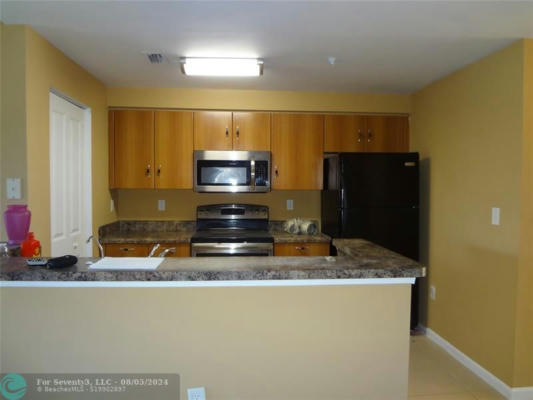 5960 W SAMPLE RD APT 307, CORAL SPRINGS, FL 33067, photo 3 of 5