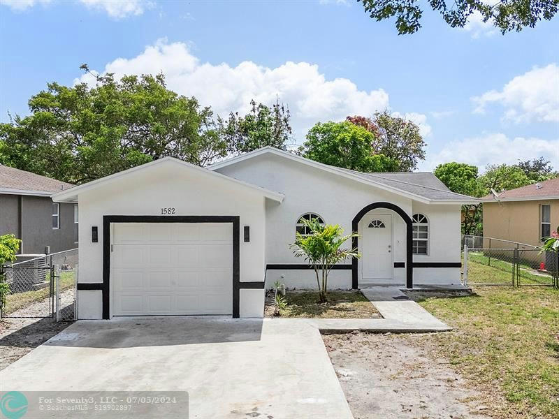 1582 NW 7TH LN, POMPANO BEACH, FL 33060, photo 1 of 22