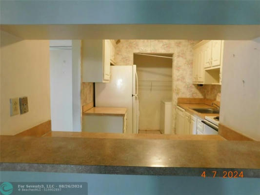 915 NE 199TH ST APT 208, MIAMI, FL 33179, photo 4 of 11