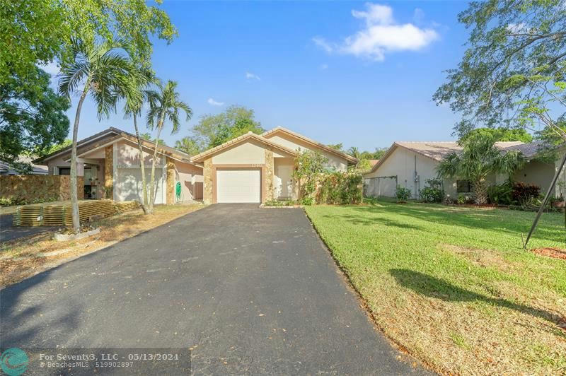 1740 NW 93RD TER, CORAL SPRINGS, FL 33071, photo 1 of 32