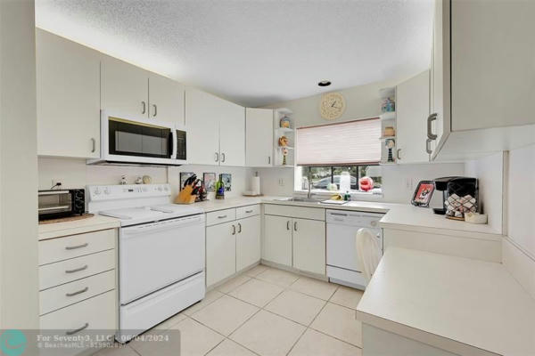 2645 NW 42ND AVE, COCONUT CREEK, FL 33066, photo 4 of 35